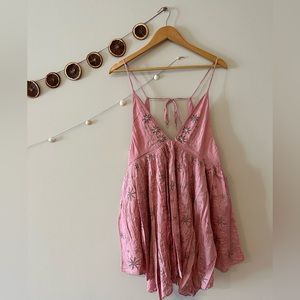 UO pink embroidered dress with gemstones sewn in.